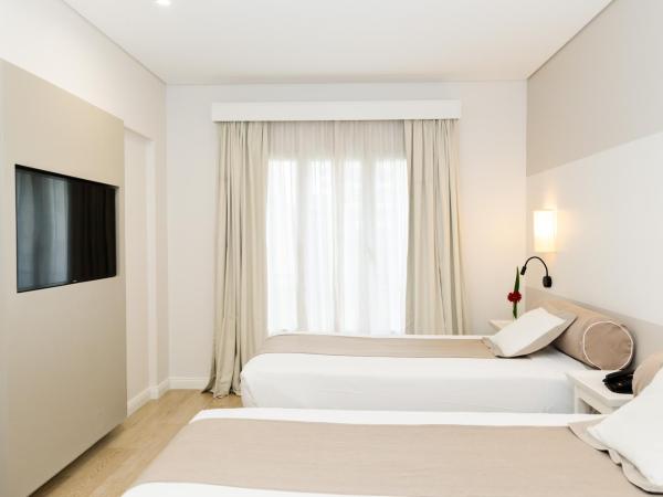 Loi Suites Recoleta Hotel : photo 3 de la chambre chambre lits jumeaux