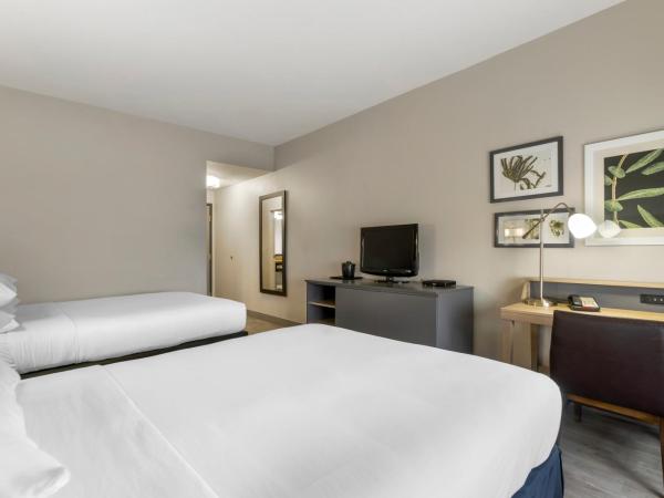 Country Inn & Suites by Radisson, Tampa Airport North, FL : photo 4 de la chambre suite 1 chambre avec 2 lits queen-size et canapé-lit