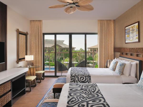 Lapita, Dubai Parks and Resorts, Autograph Collection : photo 1 de la chambre room with theme park access, guest room, 2 double, pool view (complimentary beach access to sheraton jbr and shuttle to moe & dubai mall)