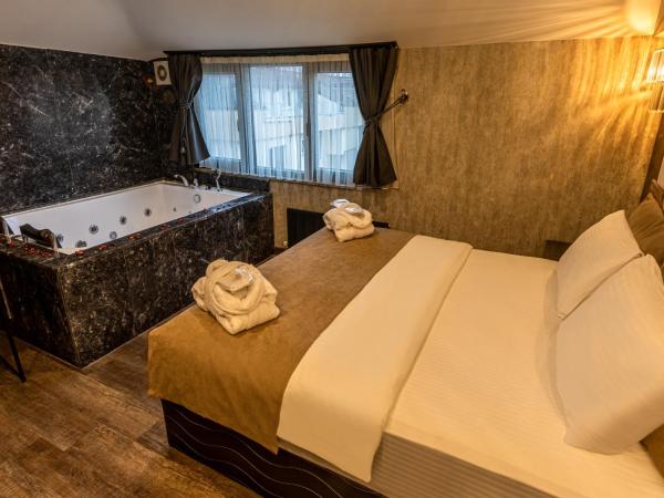 Golden Dream Otel : photo 2 de la chambre chambre lit king-size deluxe