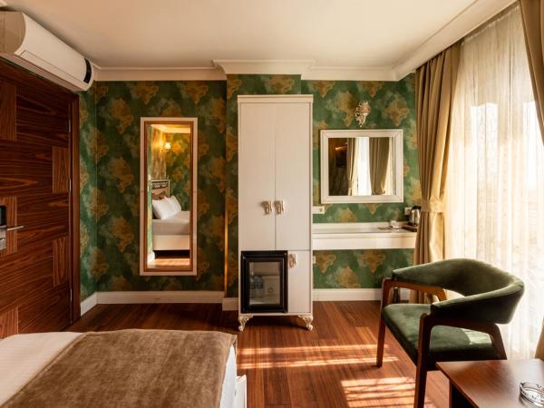 Golden Dream Otel : photo 4 de la chambre chambre triple deluxe
