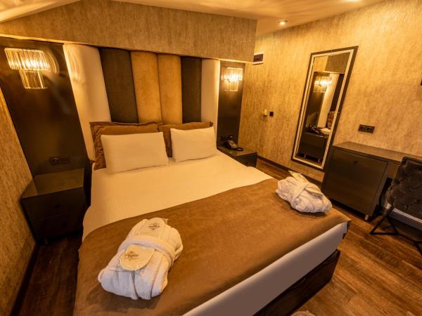 Golden Dream Otel : photo 3 de la chambre chambre lit king-size deluxe