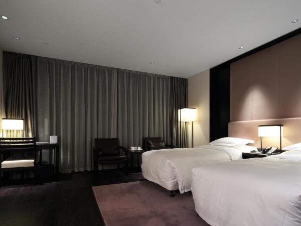 Wuhan Ziyuan Hotel : photo 1 de la chambre chambre lits jumeaux premier