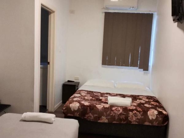 cliffinn kangaroo point : photo 1 de la chambre chambre familiale avec salle de bains