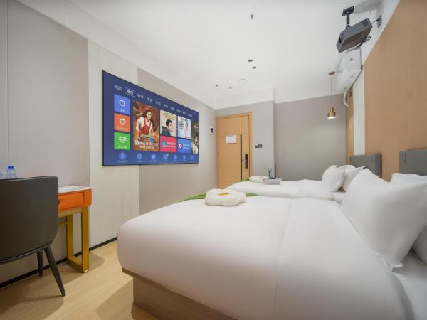 Guangzhou Yashe Hotel - Keyun Road Metro Station Pazhou Convention and Exhibition Store : photo 4 de la chambre chambre lits jumeaux deluxe