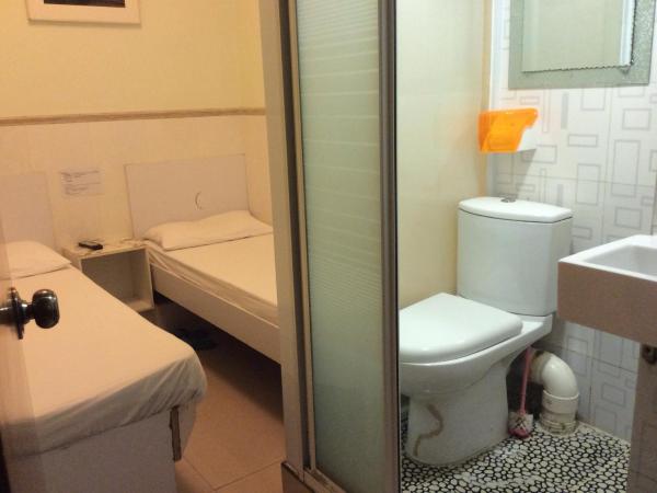 Li Cheng Guesthouse : photo 3 de la chambre petite chambre lits jumeaux