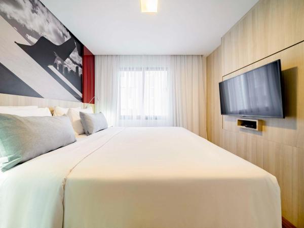 Mercure Sao Paulo Moema Times Square : photo 1 de la chambre appartement avec 1 lit double et canapé-lit