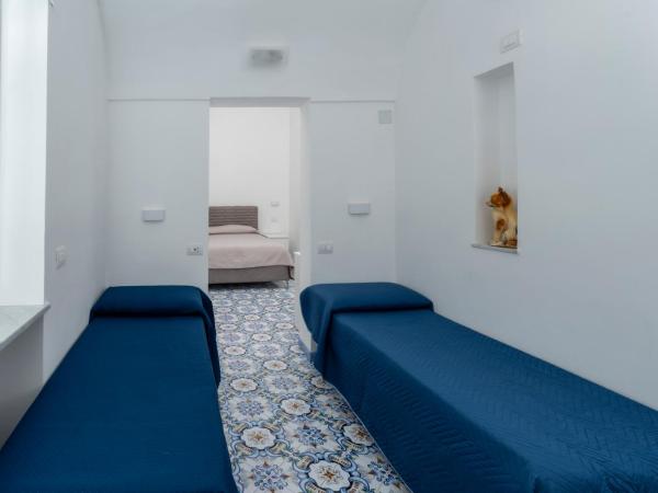 Guest House La Piazzetta : photo 2 de la chambre chambre quadruple confort