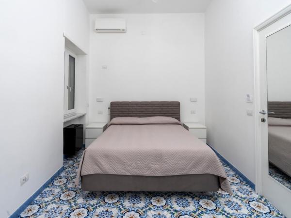 Guest House La Piazzetta : photo 3 de la chambre chambre quadruple confort