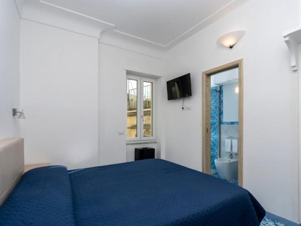 Guest House La Piazzetta : photo 3 de la chambre chambre double standard