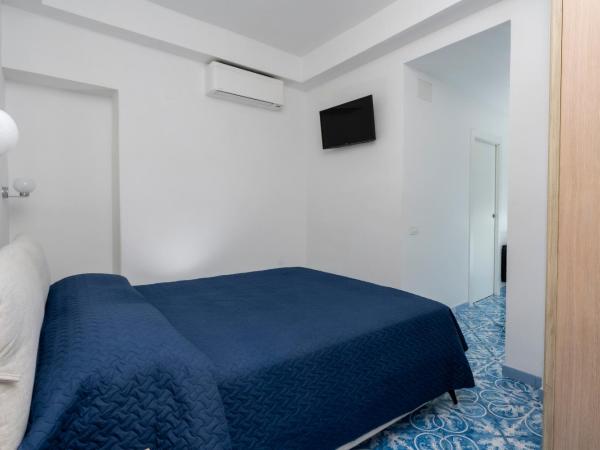 Guest House La Piazzetta : photo 4 de la chambre chambre quadruple confort