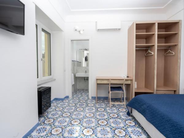 Guest House La Piazzetta : photo 10 de la chambre chambre double deluxe