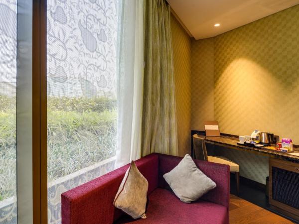 Niranta Transit Hotel Mumbai Airport - At Arrivals : photo 2 de la chambre suite junior - vue sur jardin