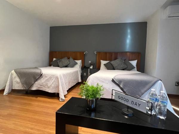 Hotel CLARUM 101 : photo 7 de la chambre chambre deluxe avec 2 lits doubles