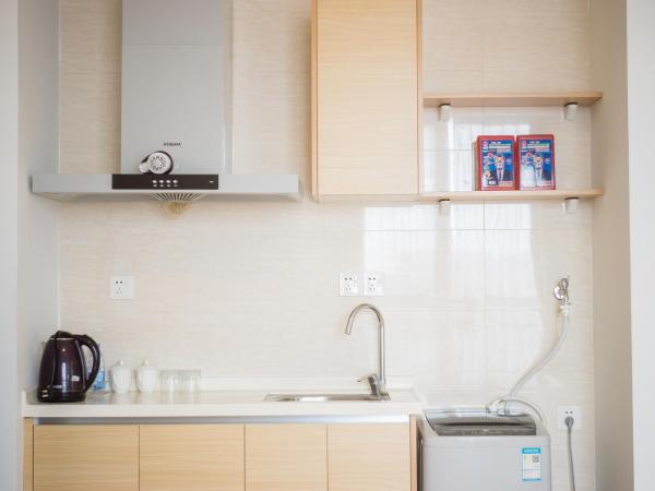 Yunying International ApartHotel - Free Shuttle Bus to Canton Fair Complex During Canton Fair Period : photo 7 de la chambre suite 1 chambre