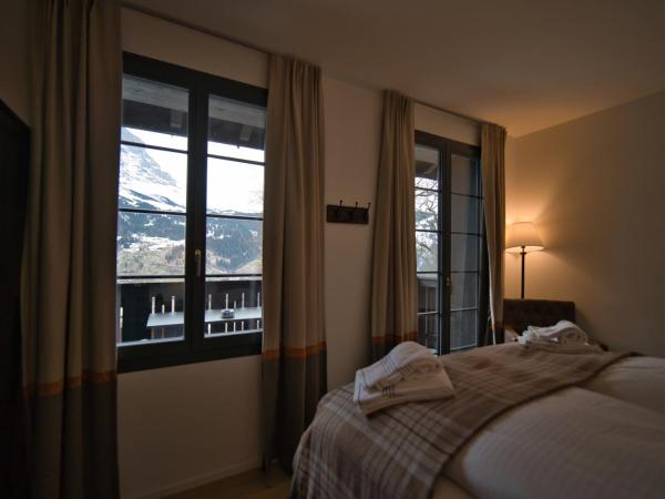Eiger View Alpine Lodge : photo 1 de la chambre wetterhorn suite with balcony and eiger view