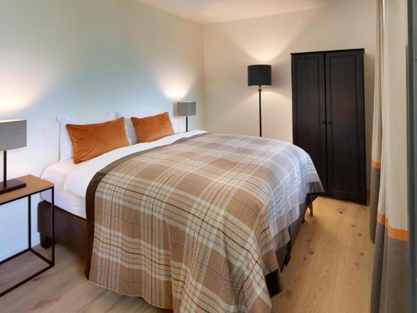 Eiger View Alpine Lodge : photo 1 de la chambre double room with balcony, eiger view and separate bathroom