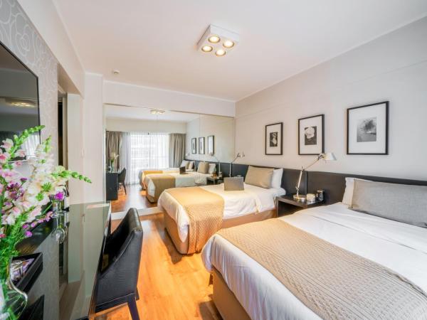 Principado Downtown : photo 2 de la chambre chambre junior avec 2 lits