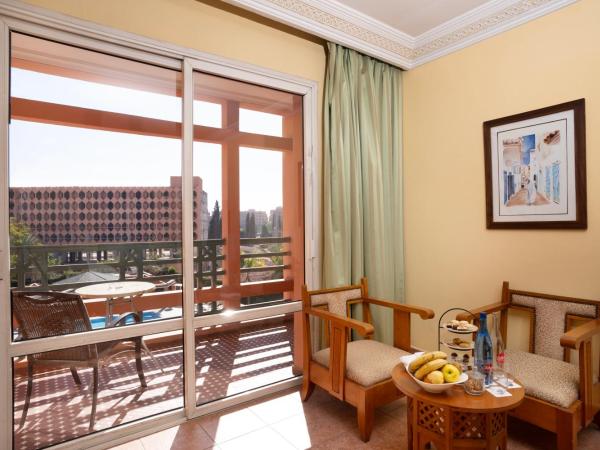 Grand Mogador Menara & Spa : photo 5 de la chambre chambre supérieure - vue sur piscine