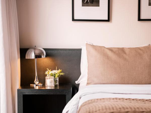 Principado Downtown : photo 1 de la chambre appartement junior