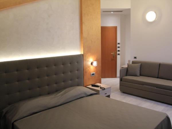 Hotel Gabbiano : photo 1 de la chambre chambre quadruple confort