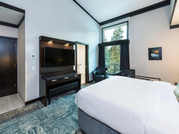 Charltons Banff : photo 1 de la chambre hébergement lit king-size deluxe - vue sur montagne