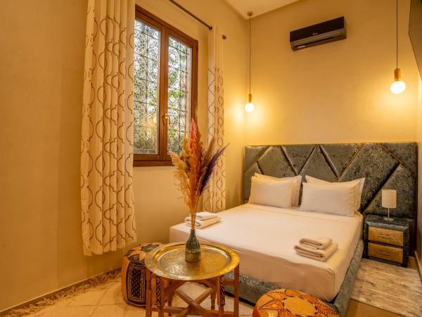Riad Azia : photo 1 de la chambre chambre simple avec salle de bains extérieure privative
