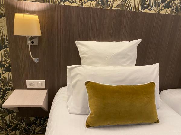 Cit'Hotel Hôtel de France et d'Europe : photo 3 de la chambre chambre lits jumeaux avec baignoire