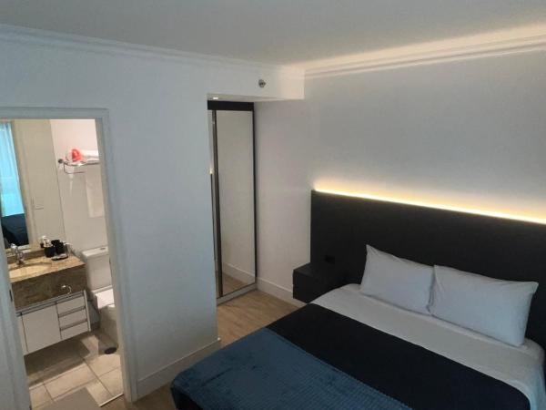HOTEL PERDIZES - FLAT Executivo - 504 : photo 8 de la chambre chambre double deluxe (2 adultes + 1 enfant)