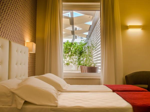 Il Gallo Bianco : photo 2 de la chambre chambre lits jumeaux