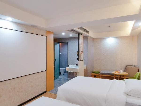 Connar Hotel - Shenzhen Futian : photo 4 de la chambre chambre lits jumeaux cinéma