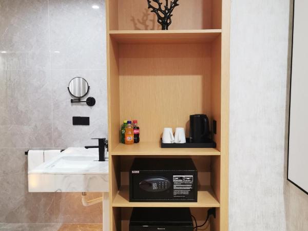 Connar Hotel - Shenzhen Futian : photo 8 de la chambre chambre lits jumeaux cinéma