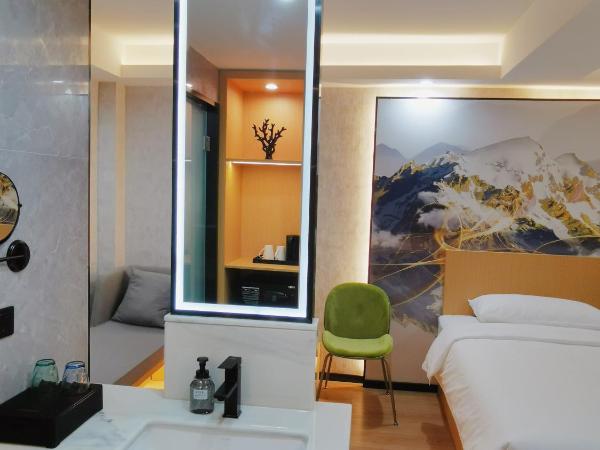 Connar Hotel - Shenzhen Futian : photo 6 de la chambre chambre lits jumeaux cinéma