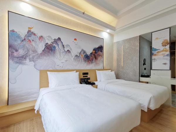 Connar Hotel - Shenzhen Futian : photo 2 de la chambre chambre lits jumeaux lumière