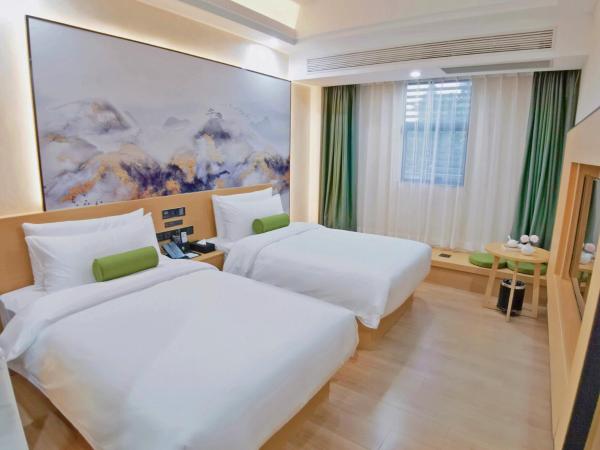 Connar Hotel - Shenzhen Futian : photo 4 de la chambre chambre lits jumeaux lumière