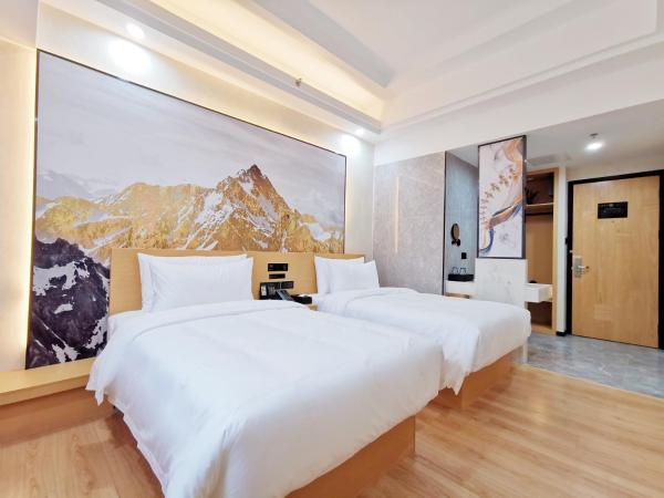 Connar Hotel - Shenzhen Futian : photo 3 de la chambre chambre lits jumeaux lumière