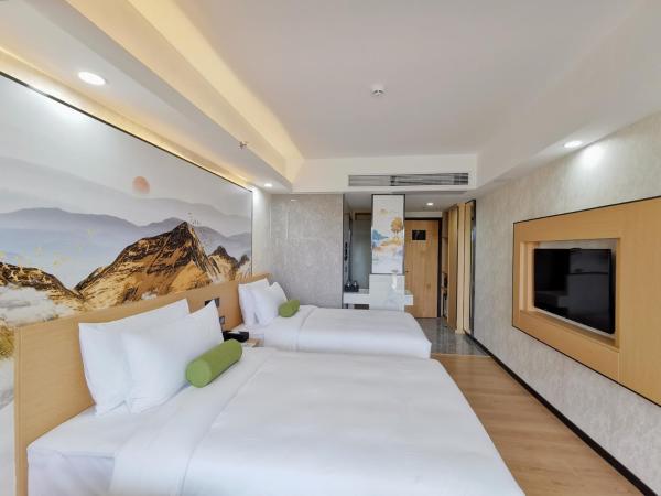 Connar Hotel - Shenzhen Futian : photo 3 de la chambre chambre lits jumeaux - vue sur cour