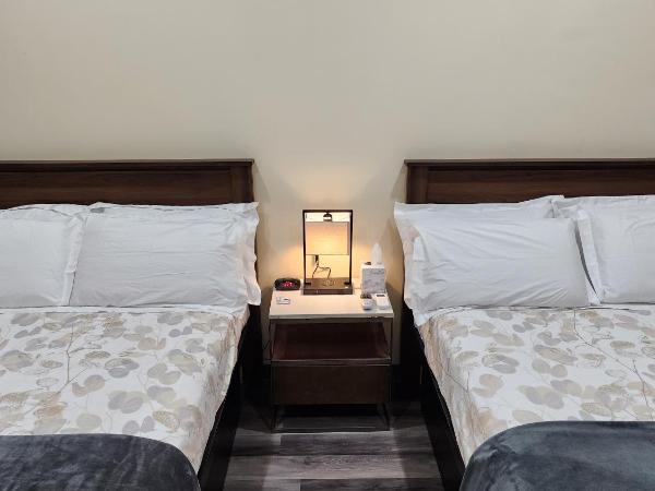 24 Hours Motel : photo 1 de la chambre hébergement triple lit queen-size