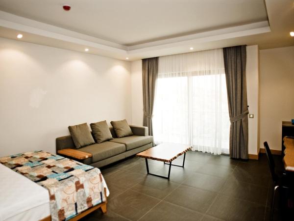 Degirmenburnu Residence : photo 6 de la chambre chambre double deluxe - vue sur mer