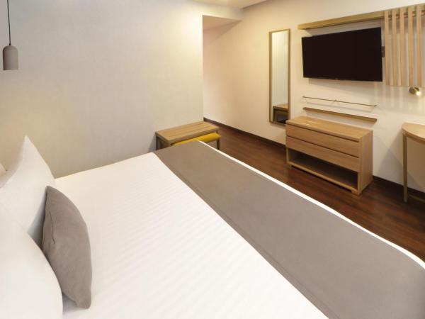 City Centro by Marriott Oaxaca : photo 9 de la chambre chambre lit king-size