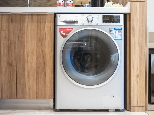 Doria Home International Apartment -Guangzhou Huijin IFC Keyun Road Metro Branch-Canton Fair Free Shuttle : photo 10 de la chambre chambre lit queen-size deluxe