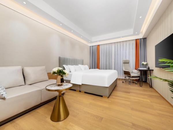 Doria Home International Apartment -Guangzhou Huijin IFC Keyun Road Metro Branch-Canton Fair Free Shuttle : photo 3 de la chambre chambre lit queen-size deluxe