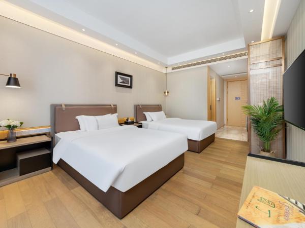 Doria Home International Apartment -Guangzhou Huijin IFC Keyun Road Metro Branch-Canton Fair Free Shuttle : photo 2 de la chambre chambre lits jumeaux deluxe