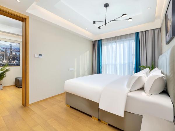 Doria Home International Apartment -Guangzhou Huijin IFC Keyun Road Metro Branch-Canton Fair Free Shuttle : photo 5 de la chambre suite 1 chambre