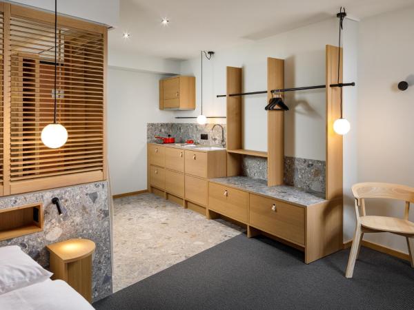 Palmiers by Fassbind : photo 3 de la chambre suite junior avec kitchenette