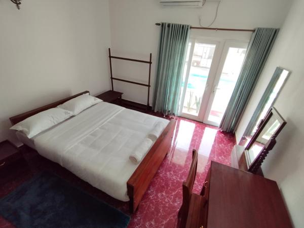 The Reds Heritage : photo 2 de la chambre chambre double - vue sur piscine