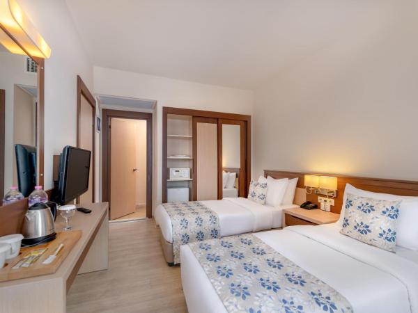 Labranda Mares Marmaris Hotel : photo 3 de la chambre chambre familiale 2 chambres - vue sur jardin