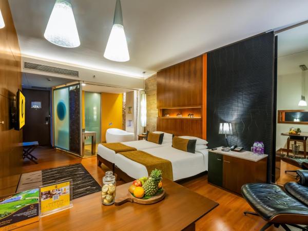 O Hotel Pune : photo 3 de la chambre chambre premier avec baignoire