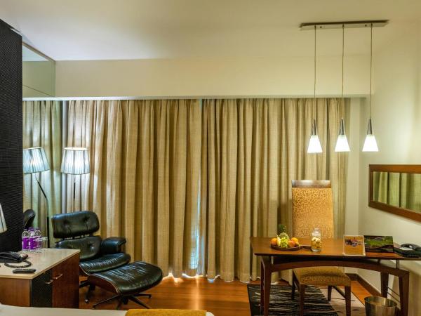 O Hotel Pune : photo 4 de la chambre chambre premier avec baignoire