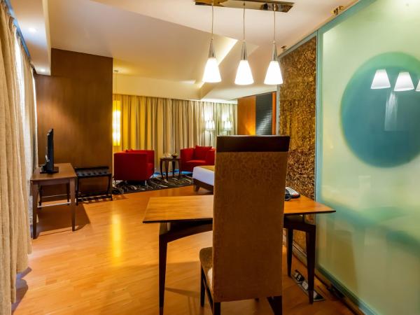 O Hotel Pune : photo 5 de la chambre suite with bathtub, 2 way airport transfer